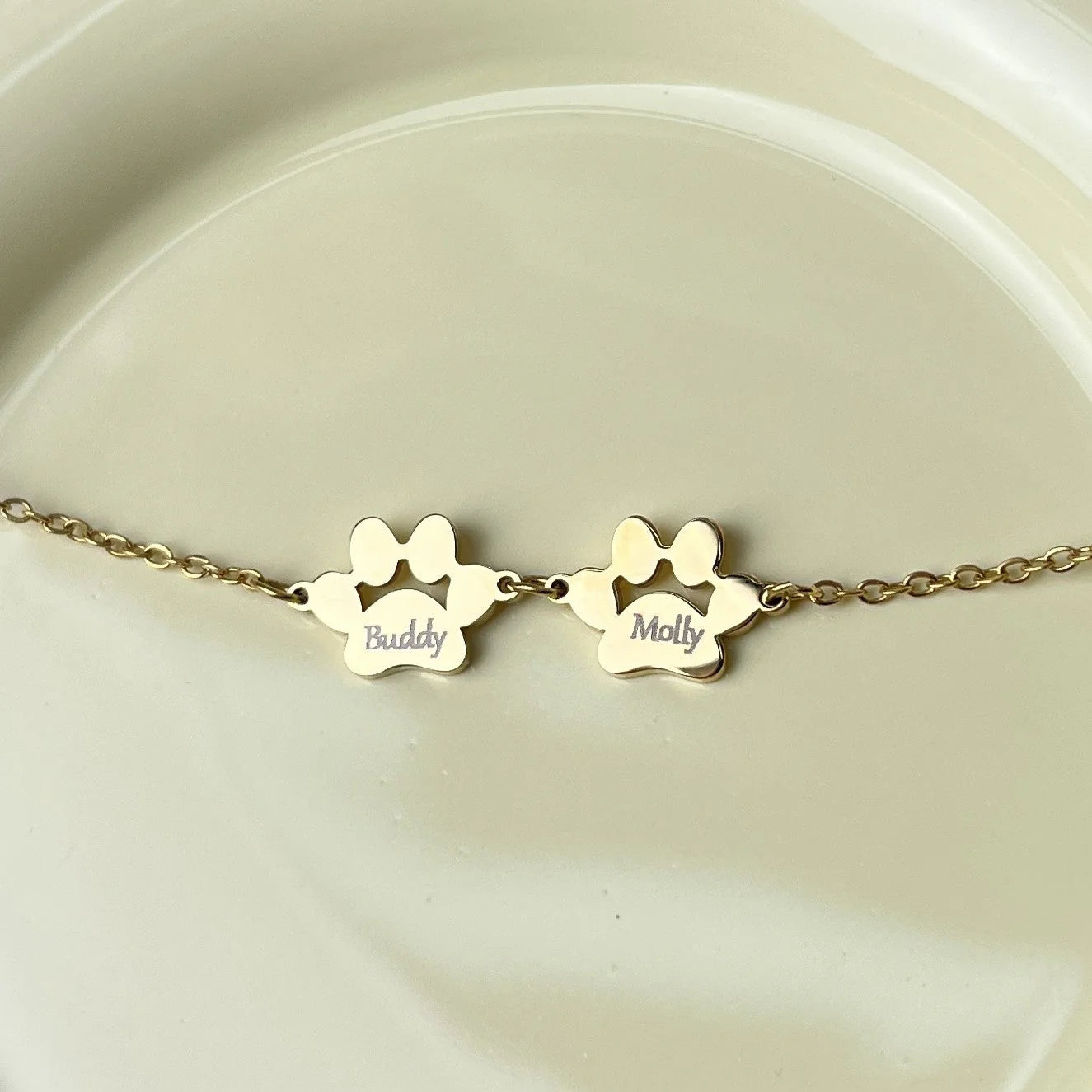 Goldenes Edelstahl-Armband mit Hundepfote